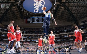 DALLAS, TX - DECEMBER 8: Luka Doncic #77 of the Dallas Mavericks dunks the ball against the Sacramento Kings on December 8, 2019 at the American Airlines Center in Dallas, Texas. NOTE TO USER: User expressly acknowledges and agrees that, by downloading and or using this photograph, User is consenting to the terms and conditions of the Getty Images License Agreement. Mandatory Copyright Notice: Copyright 2019 NBAE (Photo by Glenn James/NBAE via Getty Images)