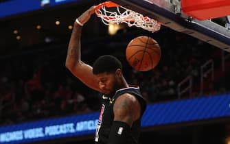 WASHINGTON, DC - DECEMBER 08: Paul George #13 of the Los Angeles Clippers dunks against the Washington Wizards during the first half at Capital One Arena on December 8, 2019 in Washington, DC. NOTE TO USER: User expressly acknowledges and agrees that, by downloading and or using this photograph, User is consenting to the terms and conditions of the Getty Images License Agreement. (Photo by Patrick Smith/Getty Images)