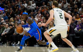 1187445877 SALT LAKE CITY, UT - DECEMBER 09: Dennis Schroder #17 of the Oklahoma City Thunder drives around Joe Ingles #2 of the Utah Jazz during a game at Vivint Smart Home Arena on December 9, 2019 in Salt Lake City, Utah. NOTE TO USER: User expressly acknowledges and agrees that, by downloading and/or using this photograph, user is consenting to the terms and conditions of the Getty Images License Agreement. (Photo by Alex Goodlett/Getty Images)