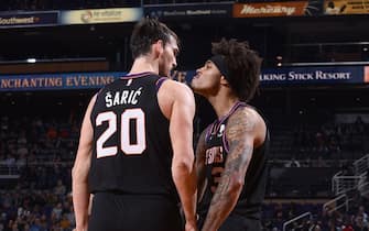 1187446040 PHOENIX, AZ - DECEMBER 9: Dario Saric #20, and Kelly Oubre Jr. #3 of the Phoenix Suns react to a play against the Minnesota Timberwolves on December 09, 2019 at Talking Stick Resort Arena in Phoenix, Arizona. NOTE TO USER: User expressly acknowledges and agrees that, by downloading and or using this photograph, user is consenting to the terms and conditions of the Getty Images License Agreement. Mandatory Copyright Notice: Copyright 2019 NBAE (Photo by Michael Gonzales/NBAE via Getty Images)