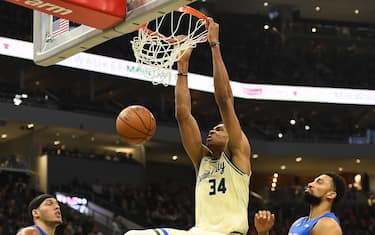 MILWAUKEE, WISCONSIN - DECEMBER 09:  Giannis Antetokounmpo #34 of the Milwaukee Bucks dunks during the first half of a game against the Orlando Magic at Fiserv Forum on December 09, 2019 in Milwaukee, Wisconsin. NOTE TO USER: User expressly acknowledges and agrees that, by downloading and or using this photograph, User is consenting to the terms and conditions of the Getty Images License Agreement. (Photo by Stacy Revere/Getty Images)