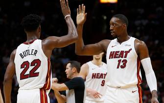 MIAMI, FLORIDA - NOVEMBER 12:  Jimmy Butler #22 of the Miami Heat celebrates with Bam Adebayo #13 against the Detroit Pistons during the second half at American Airlines Arena on November 12, 2019 in Miami, Florida. NOTE TO USER: User expressly acknowledges and agrees that, by downloading and/or using this photograph, user is consenting to the terms and conditions of the Getty Images License Agreement. (Photo by Michael Reaves/Getty Images)