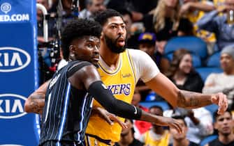 1188056189 ORLANDO, FL - DECEMBER 11: Jonathan Isaac #1 of the Orlando Magic and Anthony Davis #3 of the Los Angeles Lakers fight for position during the game on December 11, 2019 at Amway Center in Orlando, Florida. NOTE TO USER: User expressly acknowledges and agrees that, by downloading and or using this photograph, User is consenting to the terms and conditions of the Getty Images License Agreement. Mandatory Copyright Notice: Copyright 2019 NBAE (Photo by Fernando Medina/NBAE via Getty Images)