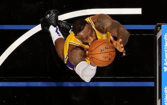 1188069182 ORLANDO, FL - DECEMBER 11: LeBron James #23 of the Los Angeles Lakers shoots the ball against the Orlando Magic on December 11, 2019 at Amway Center in Orlando, Florida. NOTE TO USER: User expressly acknowledges and agrees that, by downloading and or using this photograph, User is consenting to the terms and conditions of the Getty Images License Agreement. Mandatory Copyright Notice: Copyright 2019 NBAE (Photo by Fernando Medina/NBAE via Getty Images)