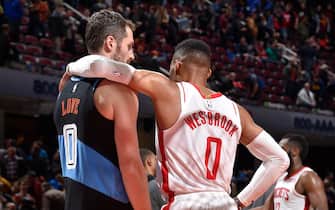 1188056168 CLEVELAND, OH - DECEMBER 11: Kevin Love #0 of the Cleveland Cavaliers talks with Russell Westbrook #0 of the Houston Rockets after the game on December 11, 2019 at Rocket Mortgage FieldHouse in Cleveland, Ohio. NOTE TO USER: User expressly acknowledges and agrees that, by downloading and/or using this Photograph, user is consenting to the terms and conditions of the Getty Images License Agreement. Mandatory Copyright Notice: Copyright 2019 NBAE (Photo by David Liam Kyle/NBAE via Getty Images)