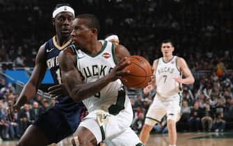 1188069517 MILWAUKEE, WI - DECEMBER 11: Eric Bledsoe #6 of the Milwaukee Bucks drives to the basket against the New Orleans Pelicans on December 11, 2019 at the Fiserv Forum Center in Milwaukee, Wisconsin. NOTE TO USER: User expressly acknowledges and agrees that, by downloading and or using this Photograph, user is consenting to the terms and conditions of the Getty Images License Agreement. Mandatory Copyright Notice: Copyright 2019 NBAE (Photo by Gary Dineen/NBAE via Getty Images).