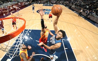 1188069285 MINNEAPOLIS, MN - DECEMBER 11: Karl-Anthony Towns #32 of the Minnesota Timberwolves dunks the ball against the Utah Jazz on December 11, 2019 at Target Center in Minneapolis, Minnesota. NOTE TO USER: User expressly acknowledges and agrees that, by downloading and or using this Photograph, user is consenting to the terms and conditions of the Getty Images License Agreement. Mandatory Copyright Notice: Copyright 2019 NBAE (Photo by David Sherman/NBAE via Getty Images)