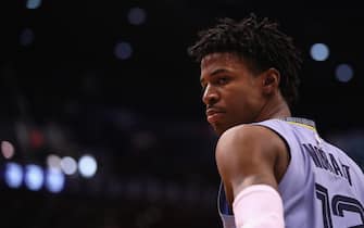 1193430925 PHOENIX, ARIZONA - DECEMBER 11: Ja Morant #12 of the Memphis Grizzlies walks onto the court during the first half of the NBA game against the Phoenix Suns at Talking Stick Resort Arena on December 11, 2019 in Phoenix, Arizona. The Grizzlies defeated the Suns 115-108. NOTE TO USER: User expressly acknowledges and agrees that, by downloading and/or using this photograph, user is consenting to the terms and conditions of the Getty Images License Agreement. (Photo by Christian Petersen/Getty Images )