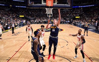 DENVER, CO - DECEMBER 12: Nikola Jokic #15 of the Denver Nuggets shoots the ball against the Portland Trail Blazers on December 12, 2019 at the Pepsi Center in Denver, Colorado. NOTE TO USER: User expressly acknowledges and agrees that, by downloading and/or using this Photograph, user is consenting to the terms and conditions of the Getty Images License Agreement. Mandatory Copyright Notice: Copyright 2019 NBAE (Photo by Garrett Ellwood/NBAE via Getty Images)