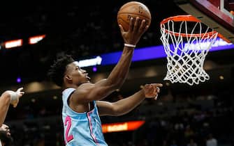 1193822455 MIAMI, FLORIDA - DECEMBER 13: Jimmy Butler #22 of the Miami Heat attempts a layup against the Los Angeles Lakers during the second half at American Airlines Arena on December 13, 2019 in Miami, Florida. NOTE TO USER: User expressly acknowledges and agrees that, by downloading and/or using this photograph, user is consenting to the terms and conditions of the Getty Images License Agreement (Photo by Michael Reaves/Getty Images)