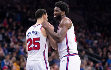 PHILADELPHIA, PA - DECEMBER 13: Ben Simmons #25 and Joel Embiid #21 of the Philadelphia 76ers react against the New Orleans Pelicans in the fourth quarter at the Wells Fargo Center on December 13, 2019 in Philadelphia, Pennsylvania. The 76ers defeated the Pelicans 116-109. NOTE TO USER: User expressly acknowledges and agrees that, by downloading and/or using this photograph, user is consenting to the terms and conditions of the Getty Images License Agreement. (Photo by Mitchell Leff/Getty Images)