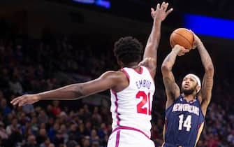 PHILADELPHIA, PA - DECEMBER 13: Brandon Ingram #14 of the New Orleans Pelicans shoots the ball against Joel Embiid #21 of the Philadelphia 76ers in the third quarter at the Wells Fargo Center on December 13, 2019 in Philadelphia, Pennsylvania. The 76ers defeated the Pelicans 116-109. NOTE TO USER: User expressly acknowledges and agrees that, by downloading and/or using this photograph, user is consenting to the terms and conditions of the Getty Images License Agreement. (Photo by Mitchell Leff/Getty Images)