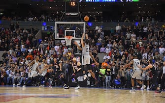 MEXICO CITY, MEXICO - DECEMBER 14: Patty Mills #8 of the San Antonio Spurs shoots the game winning shot against the Phoenix Suns as part of the NBA Mexico Games 2019 on December 14, 2019 at the Mexico City Arena in Mexico City, Mexico. NOTE TO USER: User expressly acknowledges and agrees that, by downloading and/or using this photograph, user is consenting to the terms and conditions of the Getty Images License Agreement.  Mandatory Copyright Notice: Copyright 2019 NBAE (Photo by Bill Baptist/NBAE via Getty Images)