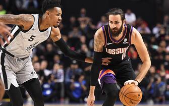 HOUSTON, TX - DECEMBER 14 : Ricky Rubio #11 of the Phoenix Suns handles the ball during the game against the San Antonio Spurs on December 14, 2019 at the  Arena Ciudad de Mexico in Mexico City, MX. NOTE TO USER: User expressly acknowledges and agrees that, by downloading and or using this photograph, User is consenting to the terms and conditions of the Getty Images License Agreement. Mandatory Copyright Notice: Copyright 2019 NBAE (Photo by Andrew D. Bernstein/NBAE via Getty Images)