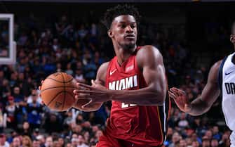 DALLAS, TX - DECEMBER 14: Jimmy Butler #22 of the Miami Heat drives to the basket against the Dallas Mavericks on December 14, 2019 at the American Airlines Center in Dallas, Texas. NOTE TO USER: User expressly acknowledges and agrees that, by downloading and or using this photograph, User is consenting to the terms and conditions of the Getty Images License Agreement. Mandatory Copyright Notice: Copyright 2019 NBAE (Photo by Glenn James/NBAE via Getty Images)