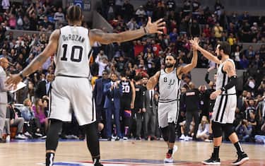 MEXICO CITY, MEXICO - DECEMBER 14: Patty Mills #8 of the San Antonio Spurs celebrates the game winning shot against the Phoenix Suns as part of the NBA Mexico Games 2019 on December 14, 2019 at the Mexico City Arena in Mexico City, Mexico. NOTE TO USER: User expressly acknowledges and agrees that, by downloading and/or using this photograph, user is consenting to the terms and conditions of the Getty Images License Agreement.  Mandatory Copyright Notice: Copyright 2019 NBAE (Photo by Andrew D. Bernstein/NBAE via Getty Images)