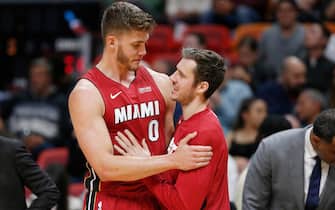 MIAMI, FLORIDA - NOVEMBER 20: Meyers Leonard #0 and Goran Dragic #7 of the Miami Heat talk against the Cleveland Cavaliers during the second half at American Airlines Arena on November 20, 2019 in Miami, Florida. NOTE TO USER: User expressly acknowledges and agrees that, by downloading and/or using this photograph, user is consenting to the terms and conditions of the Getty Images License Agreement.  (Photo by Michael Reaves/Getty Images)