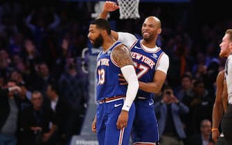 NEW YORK, NEW YORK - NOVEMBER 14:  Marcus Morris Sr. #13 of the New York Knicks celebrates hitting a three point basket with Taj Gibson #67 against the Dallas Mavericks at Madison Square Garden on November 14, 2019 in New York City. New York Knicks defeated the Dallas Mavericks 106-103. NOTE TO USER: User expressly acknowledges and agrees that, by downloading and or using this photograph, User is consenting to the terms and conditions of the Getty Images License Agreement. Mandatory Copyright Notice: Copyright 2019 NBAE (Photo by Mike Stobe/Getty Images)