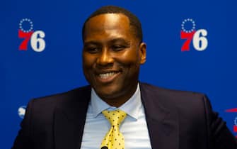 CAMDEN, NJ - SEPTEMBER 13: General Manager Elton Brand of the Philadelphia 76ers speaks at the podium prior to the team unveiling a sculpture to honor Charles Barkley at their practice facility on September 13, 2019 in Camden, New Jersey. (Photo by Mitchell Leff/Getty Images) *** Local Caption *** Elton Brand
