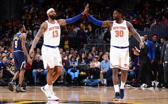 DENVER, CO - DECEMBER 15: Marcus Morris Sr. #13 of the New York Knicks and Julius Randle #30 of the New York Knicks high-five during a game against the Denver Nuggets on December 15, 2019 at the Pepsi Center in Denver, Colorado. NOTE TO USER: User expressly acknowledges and agrees that, by downloading and/or using this Photograph, user is consenting to the terms and conditions of the Getty Images License Agreement. Mandatory Copyright Notice: Copyright 2019 NBAE (Photo by Bart Young/NBAE via Getty Images)