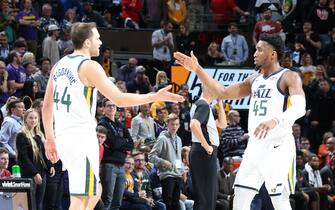 SALT LAKE CITY, UT - DECEMBER 17: Bojan Bogdanovic #44, and Donovan Mitchell #45 of the Utah Jazz hi-five each other during the game against the Orlando Magic on December 17, 2019 at Vivint Smart Home Arena in Salt Lake City, Utah. NOTE TO USER: User expressly acknowledges and agrees that, by downloading and or using this Photograph, User is consenting to the terms and conditions of the Getty Images License Agreement. Mandatory Copyright Notice: Copyright 2019 NBAE (Photo by Melissa Majchrzak/NBAE via Getty Images)