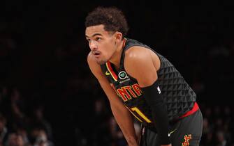 NEW YORK, NY - December 17: Trae Young #11 of the Atlanta Hawks looks on during the game against the New York Knicks on December 17, 2019 at Madison Square Garden in New York City, New York.  NOTE TO USER: User expressly acknowledges and agrees that, by downloading and or using this photograph, User is consenting to the terms and conditions of the Getty Images License Agreement. Mandatory Copyright Notice: Copyright 2019 NBAE  (Photo by Nathaniel S. Butler/NBAE via Getty Images)