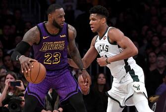 LOS ANGELES, CALIFORNIA - MARCH 01: LeBron James #23 of the Los Angeles Lakers is guraded by Giannis Antetokounmpo #34 of the Milwaukee Bucks during the game at Staples Center on March 01, 2019 in Los Angeles, California. NOTE TO USER: User expressly acknowledges and agrees that, by downloading and or using this photograph, User is consenting to the terms and conditions of the Getty Images License Agreement.  (Photo by Kevork Djansezian/Getty Images)