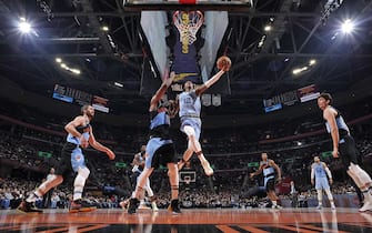 CLEVELAND, OH - DECEMBER 20: Ja Morant #12 of the Memphis Grizzlies shoots the ball against the Cleveland Cavaliers on December 20, 2019 at Rocket Mortgage FieldHouse in Cleveland, Ohio. NOTE TO USER: User expressly acknowledges and agrees that, by downloading and/or using this Photograph, user is consenting to the terms and conditions of the Getty Images License Agreement. Mandatory Copyright Notice: Copyright 2019 NBAE (Photo by David Liam Kyle/NBAE via Getty Images)
