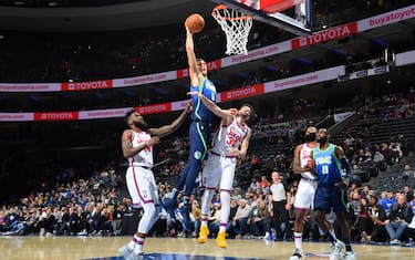 PHILADELPHIA, PA - DECEMBER 20: Kristaps Porzingis #6 of the Dallas Mavericks dunks the ball against the Philadelphia 76ers on December 20, 2019 at the Wells Fargo Center in Philadelphia, Pennsylvania NOTE TO USER: User expressly acknowledges and agrees that, by downloading and/or using this Photograph, user is consenting to the terms and conditions of the Getty Images License Agreement. Mandatory Copyright Notice: Copyright 2019 NBAE (Photo by Jesse D. Garrabrant/NBAE via Getty Images)