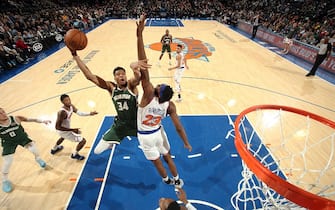 NEW YORK, NY - DECEMBER 21: Giannis Antetokounmpo #34 of the Milwaukee Bucks shoots the ball during the game against the New York Knicks on December 21, 2019 at Madison Square Garden in New York City, New York.  NOTE TO USER: User expressly acknowledges and agrees that, by downloading and or using this photograph, User is consenting to the terms and conditions of the Getty Images License Agreement. Mandatory Copyright Notice: Copyright 2019 NBAE  (Photo by Nathaniel S. Butler/NBAE via Getty Images)
