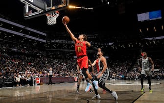 BROOKLYN, NY - DECEMBER 21: Trae Young #11 of the Atlanta Hawks shoots the ball against the Brooklyn Nets on December 21, 2019 at Barclays Center in Brooklyn, New York. NOTE TO USER: User expressly acknowledges and agrees that, by downloading and or using this photograph, User is consenting to the terms and conditions of the Getty Images License Agreement. Mandatory Copyright Notice: Copyright 2019 NBAE  (Photo by Brian Babineau/NBAE via Getty Images)