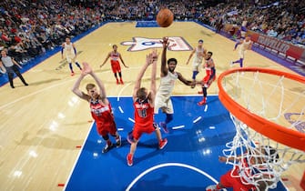 PHILADELPHIA, PA - DECEMBER 21: Joel Embiid #21 of the Philadelphia 76ers shoots the ball against the Washington Wizards on December 21, 2019 at the Wells Fargo Center in Philadelphia, Pennsylvania. NOTE TO USER: User expressly acknowledges and agrees that, by downloading and/or using this Photograph, user is consenting to the terms and conditions of the Getty Images License Agreement. Mandatory Copyright Notice: Copyright 2019 NBAE (Photo by Jesse D. Garrabrant/NBAE via Getty Images)