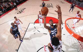 PORTLAND, OR - DECEMBER 21: Andrew Wiggins #22 of the Minnesota Timberwolves shoots the ball against the Portland Trail Blazers on December 21, 2019 at the Moda Center in Portland, Oregon. NOTE TO USER: User expressly acknowledges and agrees that, by downloading and or using this Photograph, user is consenting to the terms and conditions of the Getty Images License Agreement. Mandatory Copyright Notice: Copyright 2019 NBAE (Photo by Sam Forencich/NBAE via Getty Images)