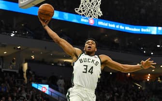 MILWAUKEE, WISCONSIN - DECEMBER 22: Giannis Antetokounmpo #34 of the Milwaukee Bucks dunks the basketball in the first half against the Indiana Pacers at Fiserv Forum on December 22, 2019 in Milwaukee, Wisconsin. NOTE TO USER: User expressly acknowledges and agrees that, by downloading and or using this photograph, User is consenting to the terms and conditions of the Getty Images License Agreement.  (Photo by Quinn Harris/Getty Images)