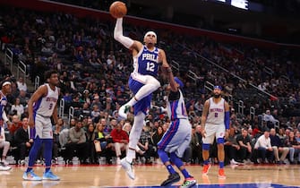 1195678099 DETROIT, MICHIGAN - DECEMBER 23: Tobias Harris #12 of the Philadelphia 76ers drives to the basket past Tim Frazier #12 of the Detroit Pistons during the second half at Little Caesars Arena on December 23, 2019 in Detroit, Michigan. Philadelphia won the game 125-109. NOTE TO USER: User expressly acknowledges and agrees that, by downloading and or using this photograph, User is consenting to the terms and conditions of the Getty Images License Agreement. (Photo by Gregory Shamus/Getty Images)