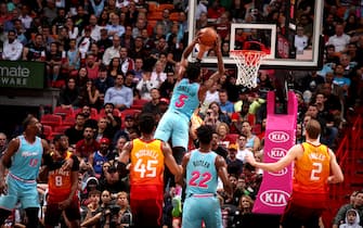 MIAMI, FL - DECEMBER 23: Derrick Jones Jr. #5 of the Miami Heat goes up for a dunk during a game against the Utah Jazz on December 23, 2019 at American Airlines Arena in Miami, Florida. NOTE TO USER: User expressly acknowledges and agrees that, by downloading and or using this Photograph, user is consenting to the terms and conditions of the Getty Images License Agreement. Mandatory Copyright Notice: Copyright 2019 NBAE (Photo by Issac Baldizon/NBAE via Getty Images)