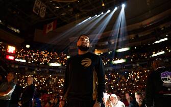 TORONTO, CANADA - DECEMBER 25: Fred VanVleet #23 of the Toronto Raptors stands for the National Anthem prior to a game against the Boston Celtics on December 25, 2019 at the Scotiabank Arena in Toronto, Ontario, Canada.  NOTE TO USER: User expressly acknowledges and agrees that, by downloading and or using this Photograph, user is consenting to the terms and conditions of the Getty Images License Agreement.  Mandatory Copyright Notice: Copyright 2019 NBAE (Photo by Mark Blinch/NBAE via Getty Images)