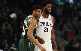 MILWAUKEE, WISCONSIN - MARCH 17:  Giannis Antetokounmpo #34 of the Milwaukee Bucks works against Joel Embiid #21 of the Philadelphia 76ers during a game at Fiserv Forum on March 17, 2019 in Milwaukee, Wisconsin. NOTE TO USER: User expressly acknowledges and agrees that, by downloading and or using this photograph, User is consenting to the terms and conditions of the Getty Images License Agreement. (Photo by Stacy Revere/Getty Images)