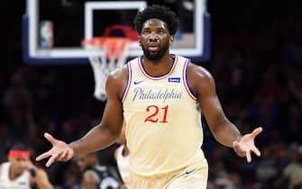 1195942948 PHILADELPHIA, PENNSYLVANIA - DECEMBER 25: Joel Embiid #21 of the Philadelphia 76ers reacts after scoring during the first half of the game against the Milwaukee Bucks at Wells Fargo Center on December 25, 2019 in Philadelphia, Pennsylvania. NOTE TO USER: User expressly acknowledges and agrees that, by downloading and or using this photograph, User is consenting to the terms and conditions of the Getty Images License Agreement. (Photo by Sarah Stier/Getty Images)