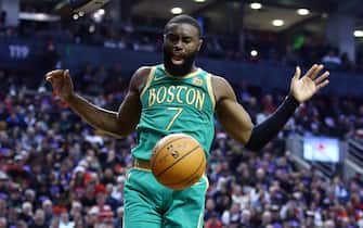 TORONTO, ON - DECEMBER 25:  Jaylen Brown #7 of the Boston Celtics dunks the ball during the first half of an NBA game against the Toronto Raptors at Scotiabank Arena on December 25, 2019 in Toronto, Canada.  NOTE TO USER: User expressly acknowledges and agrees that, by downloading and or using this photograph, User is consenting to the terms and conditions of the Getty Images License Agreement.  (Photo by Vaughn Ridley/Getty Images)