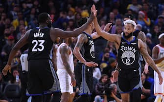 SAN FRANCISCO, CALIFORNIA - DECEMBER 25: Draymond Green #23 and Ky Bowman #12 of the Golden State Warriors celebrates after they scored against the Houston Rockets during the first half of an NBA basketball game at Chase Center on December 25, 2019 in San Francisco, California. NOTE TO USER: User expressly acknowledges and agrees that, by downloading and or using this photograph, User is consenting to the terms and conditions of the Getty Images License Agreement. (Photo by Thearon W. Henderson/Getty Images)