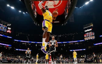 ATLANTA, GEORGIA - DECEMBER 15:  LeBron James #23 of the Los Angeles Lakers dunks against the Atlanta Hawks in the first half at State Farm Arena on December 15, 2019 in Atlanta, Georgia.  NOTE TO USER: User expressly acknowledges and agrees that, by downloading and/or using this photograph, user is consenting to the terms and conditions of the Getty Images License Agreement.  (Photo by Kevin C. Cox/Getty Images)