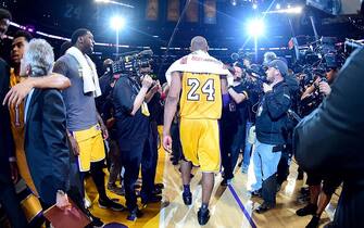 LOS ANGELES, CA - APRIL 13:  Kobe Bryant #24 of the Los Angeles Lakers walks towards the tunnel after scoring 60 points against the Utah Jazz at Staples Center on April 13, 2016 in Los Angeles, California. NOTE TO USER: User expressly acknowledges and agrees that, by downloading and or using this photograph, User is consenting to the terms and conditions of the Getty Images License Agreement.  (Photo by Harry How/Getty Images)