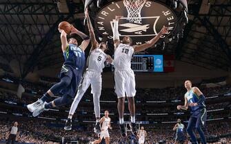 DALLAS, TX - DECEMBER 26: Luka Doncic #77 of the Dallas Mavericks shoots the ball against the San Antonio Spurs on December 26, 2019 at the American Airlines Center in Dallas, Texas. NOTE TO USER: User expressly acknowledges and agrees that, by downloading and or using this photograph, User is consenting to the terms and conditions of the Getty Images License Agreement. Mandatory Copyright Notice: Copyright 2019 NBAE (Photo by Glenn James/NBAE via Getty Images)