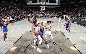 BROOKLYN, NY - DECEMBER 26: Spencer Dinwiddie #8 of the Brooklyn Nets passes the ball against the New York Knicks on December 26, 2019 at Barclays Center in Brooklyn, New York. NOTE TO USER: User expressly acknowledges and agrees that, by downloading and or using this Photograph, user is consenting to the terms and conditions of the Getty Images License Agreement. Mandatory Copyright Notice: Copyright 2019 NBAE (Photo by Nathaniel S. Butler/NBAE via Getty Images)