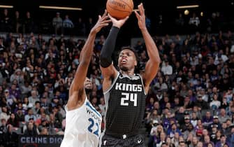 SACRAMENTO, CA - DECEMBER 26: Buddy Hield #24 of the Sacramento Kings shoots a three point basket during the game against the Minnesota Timberwolves on December 26, 2019 at Golden 1 Center in Sacramento, California. NOTE TO USER: User expressly acknowledges and agrees that, by downloading and or using this Photograph, user is consenting to the terms and conditions of the Getty Images License Agreement. Mandatory Copyright Notice: Copyright 2019 NBAE (Photo by Rocky Widner/NBAE via Getty Images)
