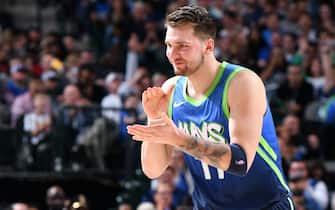 DALLAS, TX - DECEMBER 26: Luka Doncic #77 of the Dallas Mavericks reacts to play against the San Antonio Spurs on December 26, 2019 at the American Airlines Center in Dallas, Texas. NOTE TO USER: User expressly acknowledges and agrees that, by downloading and or using this photograph, User is consenting to the terms and conditions of the Getty Images License Agreement. Mandatory Copyright Notice: Copyright 2019 NBAE (Photo by Glenn James/NBAE via Getty Images)