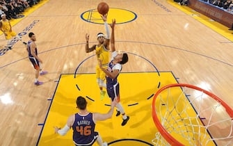 SAN FRANCISCO, CA - DECEMBER 27: D'Angelo Russell #0 of the Golden State Warriors shoots the ball against the Phoenix Suns on December 27, 2019 at Chase Center in San Francisco, California. NOTE TO USER: User expressly acknowledges and agrees that, by downloading and or using this photograph, user is consenting to the terms and conditions of Getty Images License Agreement. Mandatory Copyright Notice: Copyright 2019 NBAE (Photo by Noah Graham/NBAE via Getty Images)