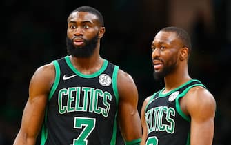 BOSTON, MA - DECEMBER 28:  Jaylen Brown #7 and Kemba Walker #8 of the Boston Celtics talk during a game against the Toronto Raptors at TD Garden on December 28, 2019 in Boston, Massachusetts. NOTE TO USER: User expressly acknowledges and agrees that, by downloading and or using this photograph, User is consenting to the terms and conditions of the Getty Images License Agreement. (Photo by Adam Glanzman/Getty Images)