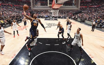 LOS ANGELES, CA - DECEMBER 28: Donovan Mitchell #45 of the Utah Jazz dunks the ball against the LA Clippers on December 28, 2019 at STAPLES Center in Los Angeles, California. NOTE TO USER: User expressly acknowledges and agrees that, by downloading and/or using this Photograph, user is consenting to the terms and conditions of the Getty Images License Agreement. Mandatory Copyright Notice: Copyright 2019 NBAE (Photo by Andrew D. Bernstein/NBAE via Getty Images) 